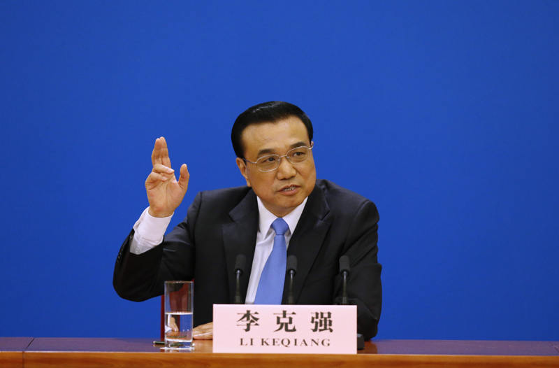3月15日，國務(wù)院總理李克強在北京人民大會堂與中外記者見面，并回答記者提問。 新華社記者 沈伯韓 攝