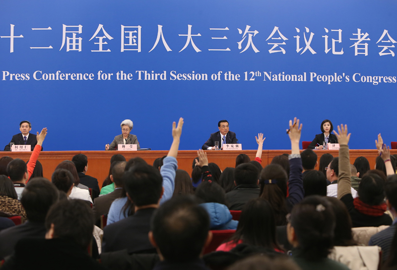 3月15日，國務(wù)院總理李克強在北京人民大會堂與中外記者見面，并回答記者提問。新華社記者 呂迅 攝