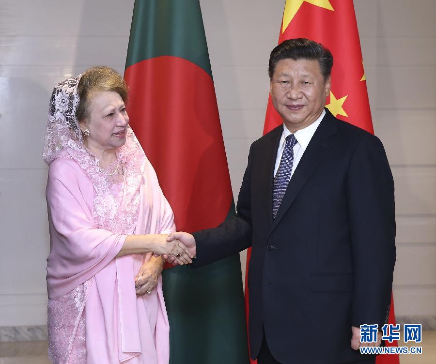 10月14日，國家主席習(xí)近平在達卡會見孟加拉國民族主義黨主席卡莉達·齊亞。  新華社記者龐興雷攝 