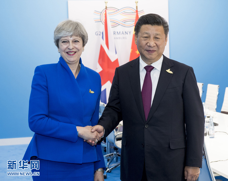 7月7日，國(guó)家主席習(xí)近平在漢堡會(huì)見(jiàn)英國(guó)首相特雷莎·梅。 新華社記者李學(xué)仁 攝